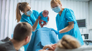 Nurse Midwives with a patient